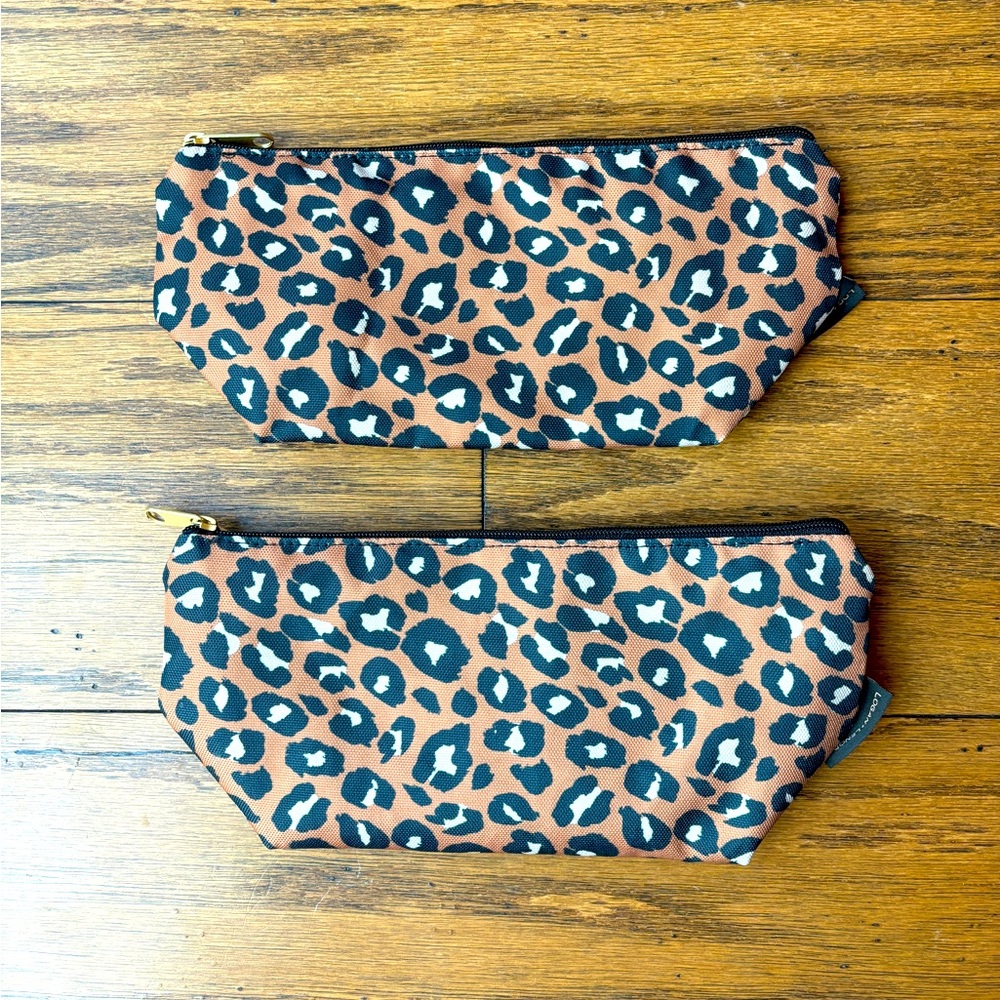 2 Logan and Lenora small leopard print pouches.